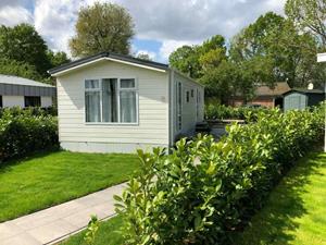 Heerlijkehuisjes.nl Comfortabel 4 persoons chalet op een vakantiepark in Lathum met een privé strand - Nederland - Europa - Lathum