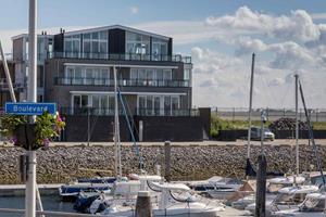 Heerlijkehuisjes.nl Modern 4 persoons appartement met uitzicht over Natuurgebied Nationaal Park Oosterschelde - Nederland - Europa - Sint-Annaland