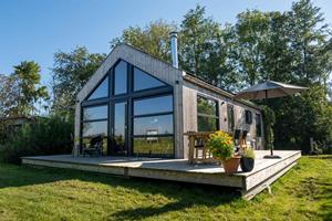 Heerlijkehuisjes.nl 6 Persoons chalet direct aan het water gelegen op een vakantiepark in Friesland - Nederland - Europa - Nes