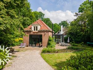 Heerlijkehuisjes.nl Een charmant 6-persoons koetshuis met open haard en ruime tuin in Koudekerke - Nederland - Europa - Koudekerke