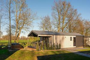 Heerlijkehuisjes.nl Luxe 2 persoons lodge met privé sauna en hottub op een vakantiepark nabij Enter - Salland - Nederland - Europa - Enter