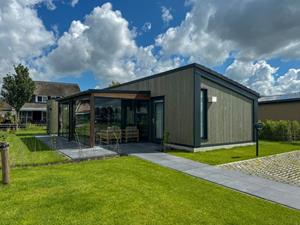 Heerlijkehuisjes.nl Prachtige 4-persoons lodge met eigen tuinkamer, airco en ligplaats in Delfstrahuizen - Nederland - Europa - Delfstrahuizen