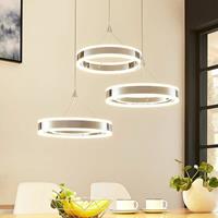 Lampenwelt.com LED-Pendellampe Lyani, 3 Ringe, Höhe verschieden