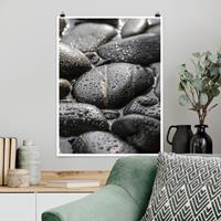 Klebefieber Poster Schwarze Steine im Wasser