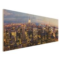 Bilderwelten Holzbild Architektur & Skyline - Panorama New York Skyline bei Nacht