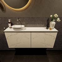 Mondiaz Fowy toiletmeubel 120x50x23cm Carrara mat 0 kraangaten wasbak: links 2 deuren solid surface met blad Melamine kleur wasbak: wit FOWY59029Carraratalc