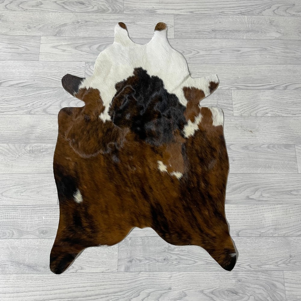 Lederstore Kleine koeienhuid bruin wit zwart (Normandiër) 90x60cm
