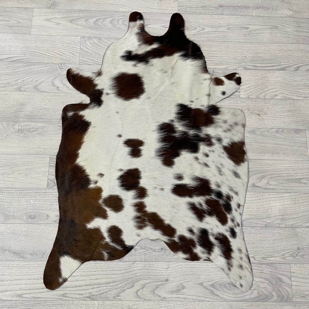 Lederstore Kleine koeienhuid bruin wit zwart (Normandiër) 90x60cm