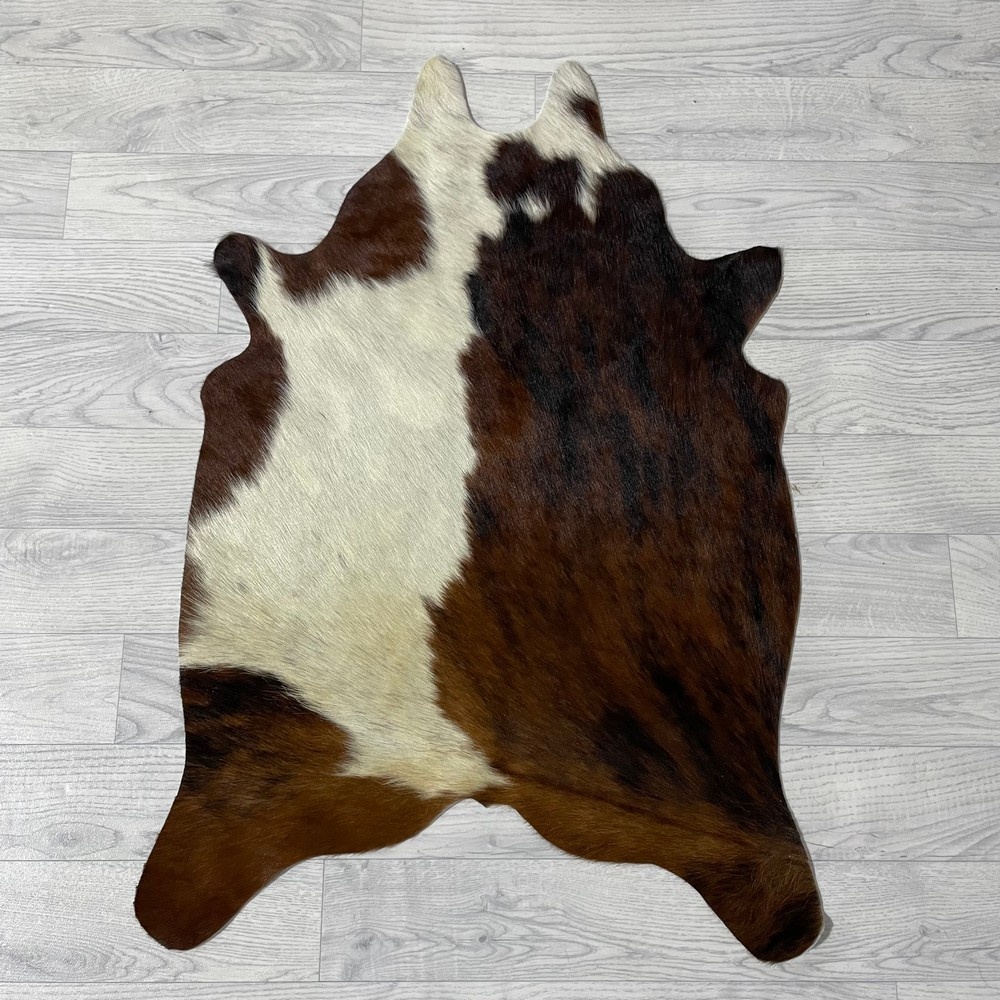 Lederstore Kleine koeienhuid bruin wit zwart (Normandiër) 90x60cm
