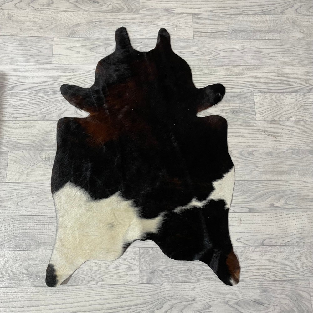 Lederstore Kleine koeienhuid bruin wit zwart (Normandiër) 90x60cm