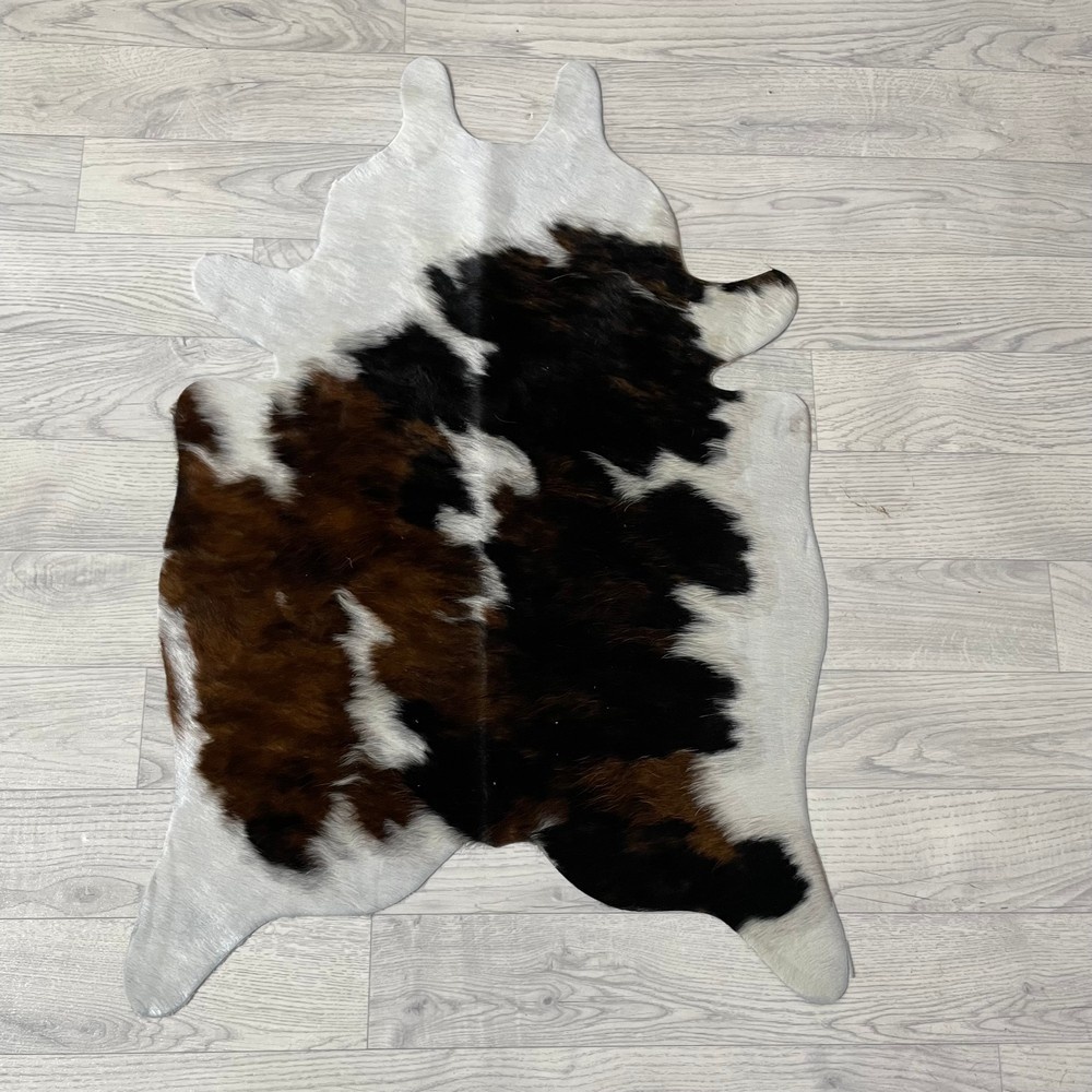 Lederstore Kleine koeienhuid bruin wit zwart (Normandiër) 90x60cm
