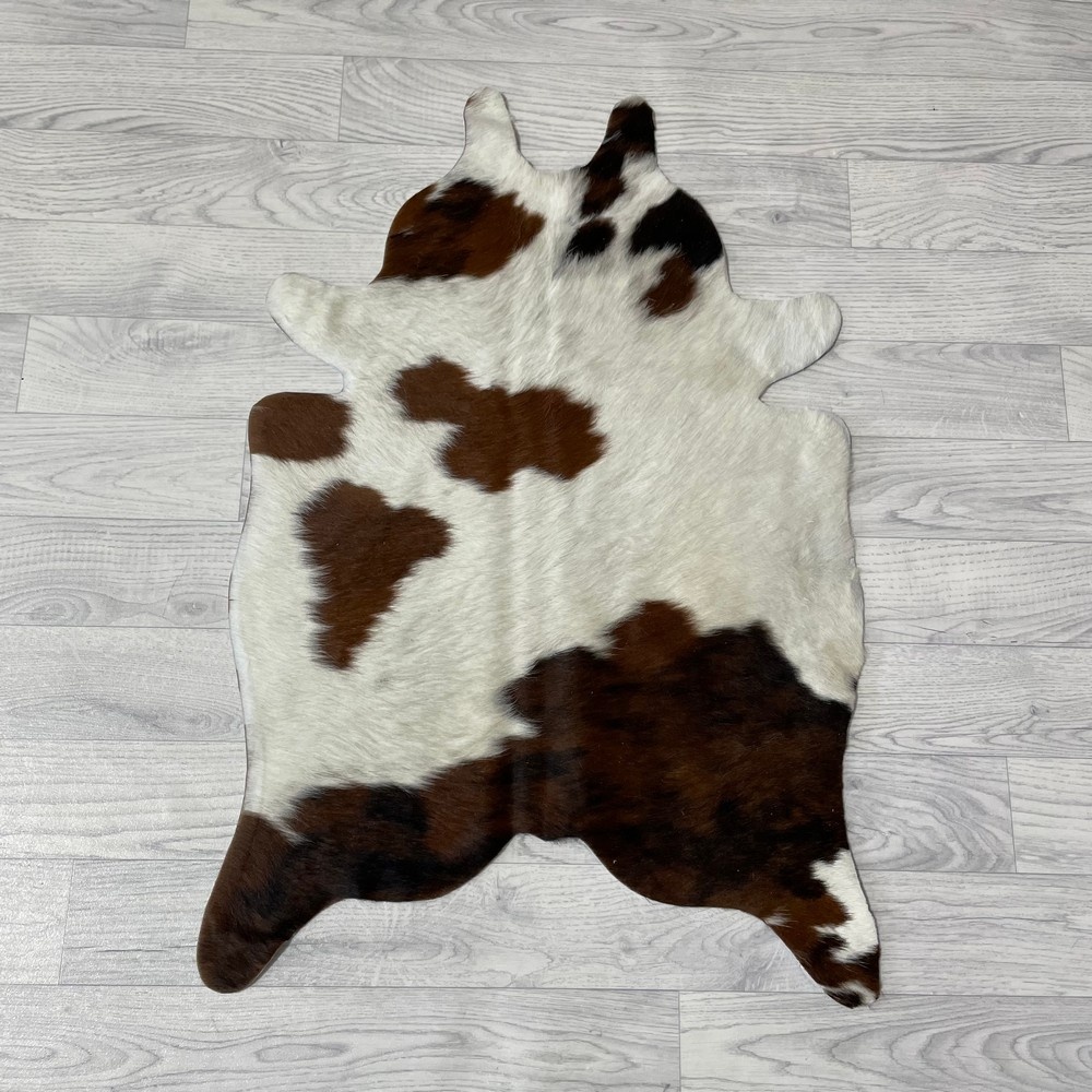 Lederstore Kleine koeienhuid bruin wit zwart (Normandiër) 90x60cm
