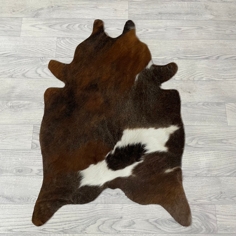 Lederstore Kleine koeienhuid bruin wit zwart (Normandiër) 90x60cm