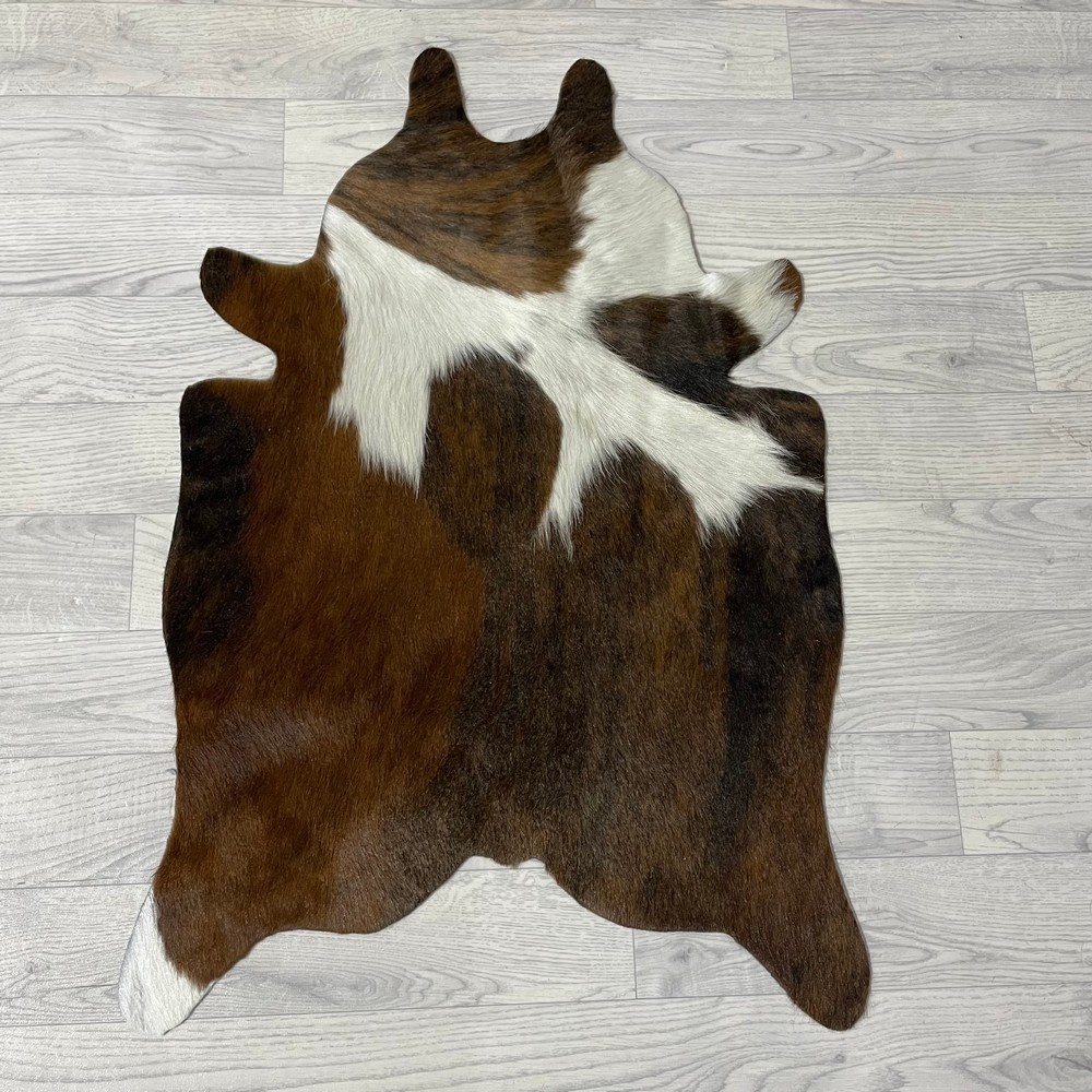 Lederstore Kleine koeienhuid bruin wit zwart (Normandiër) 90x60cm
