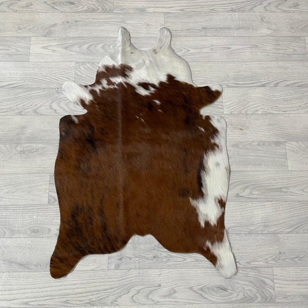 Lederstore Kleine koeienhuid bruin wit zwart (Normandiër) 90x60cm
