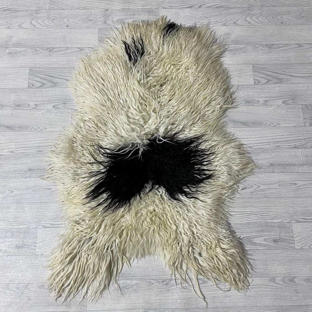 Lederstore Groenlandse schapenvacht zwart wit 110x75cm M